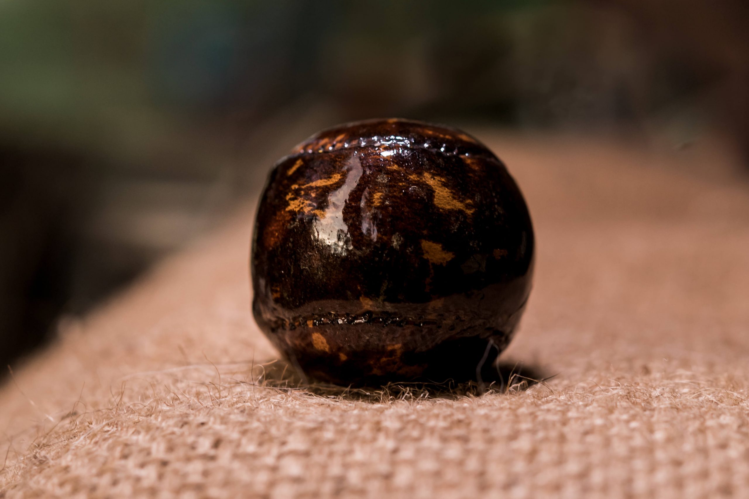 brown marble feathery golf ball
